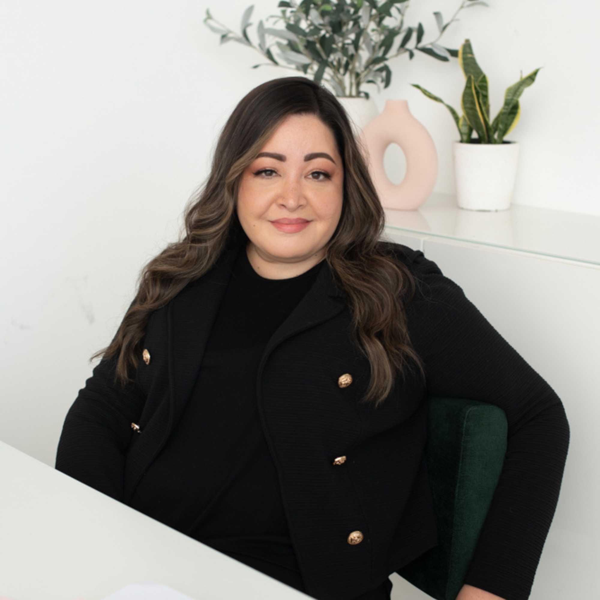 Woman in Chair Smiling